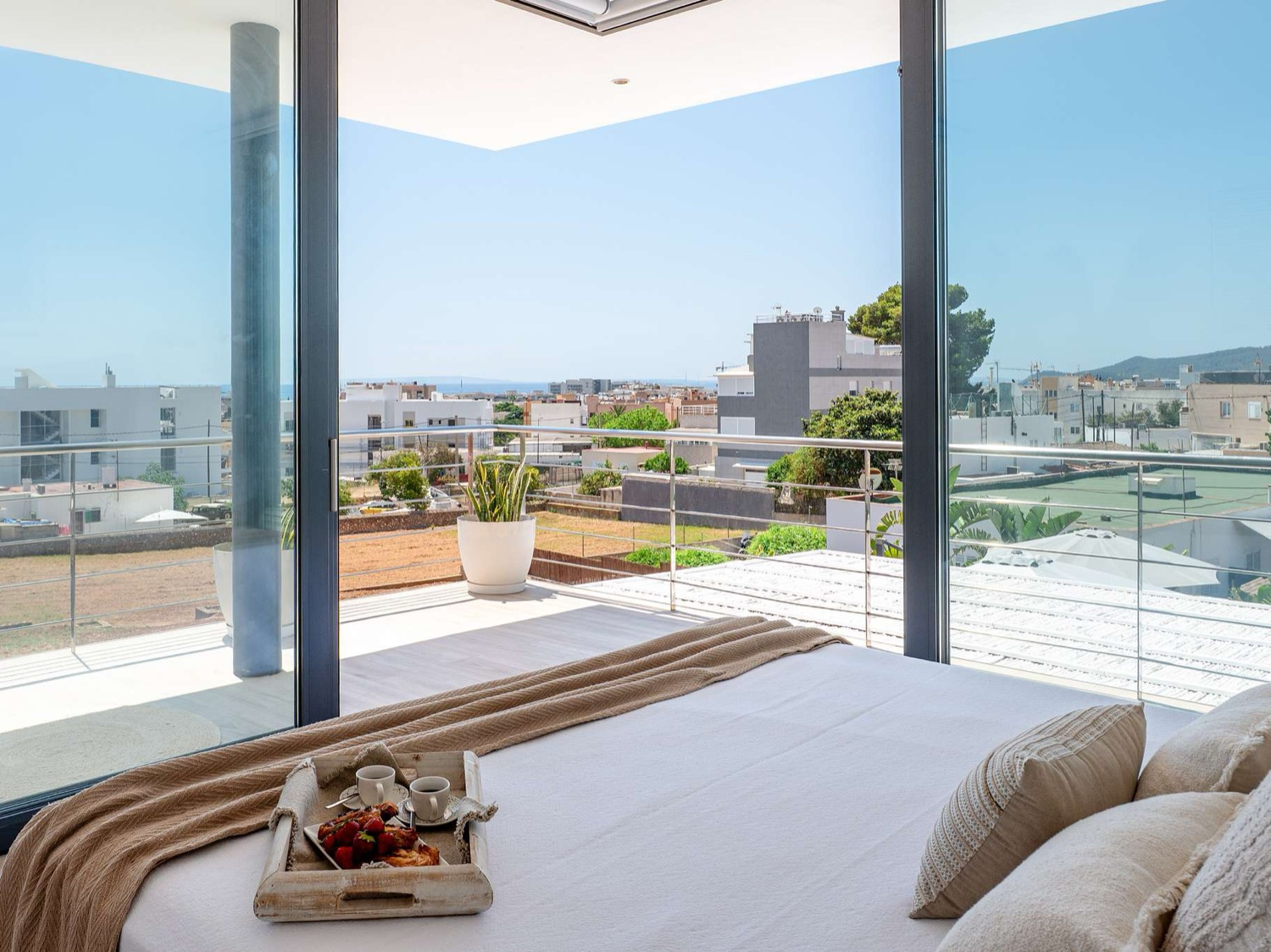 Bedroom with terrace views